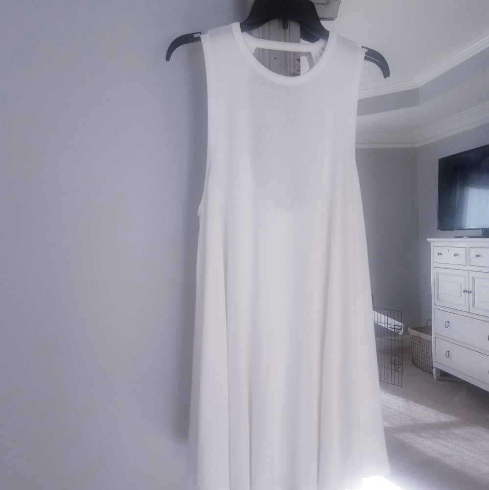 White sleeveless dress.